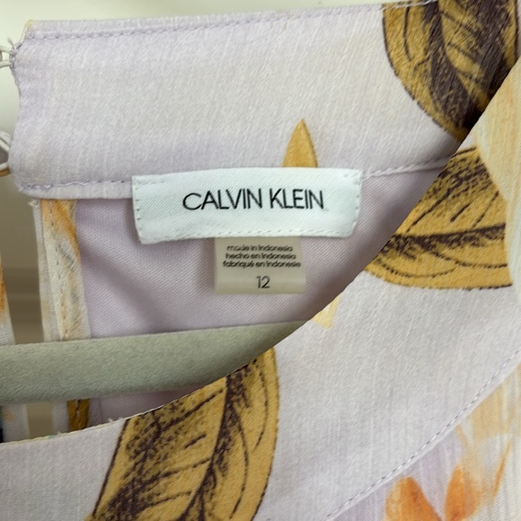 Calvin Klein size 12 floral cocktail dress with layered hem. Fully lined. - Picture 3 of 7